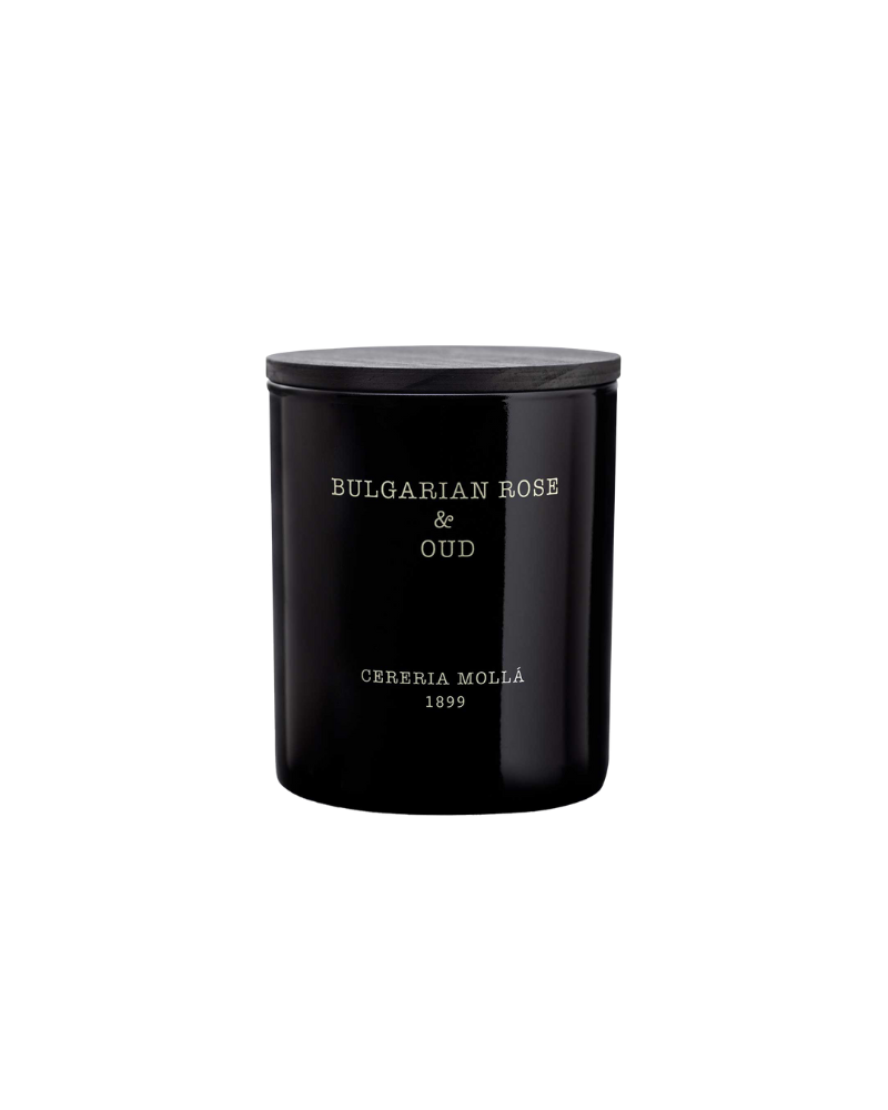 A black cylindrical bottle with a silver label that reads 'Bulgarian Rose Oud' and the brand name 'Cereia Molla' with a date '1999'.
